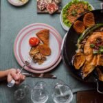 Planning a Steak Dinner with Shared Starters and Sides